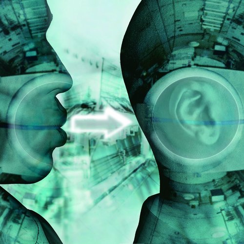 A whisper from mouth to ear, representing the spread of memes and narratives